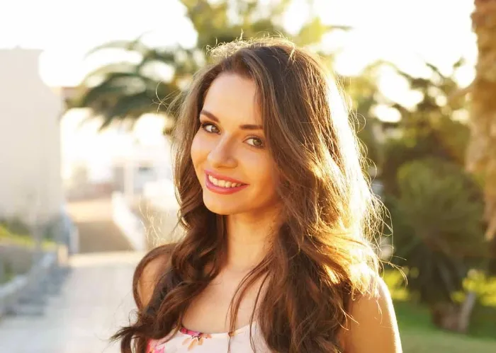 cute smiling girl looking at you