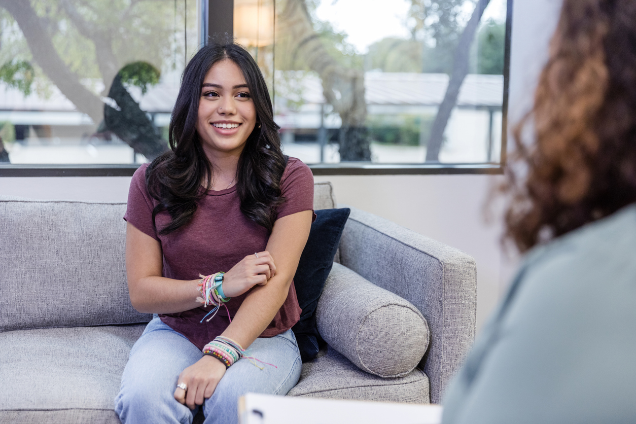woman talking to her therapist.