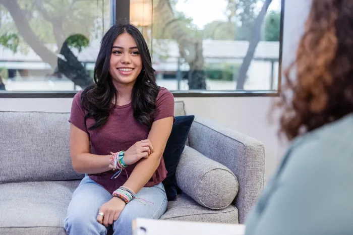 woman talking to her therapist.