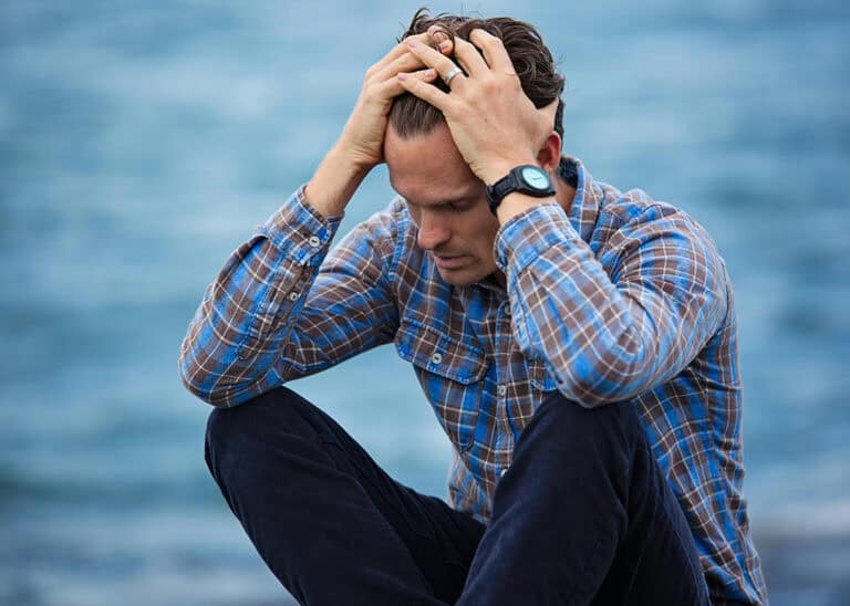 man frustrated with relationship due to abandonment issues
